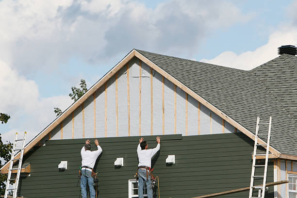 Professional Siding Replacement technician working in Chevy Chase, MD